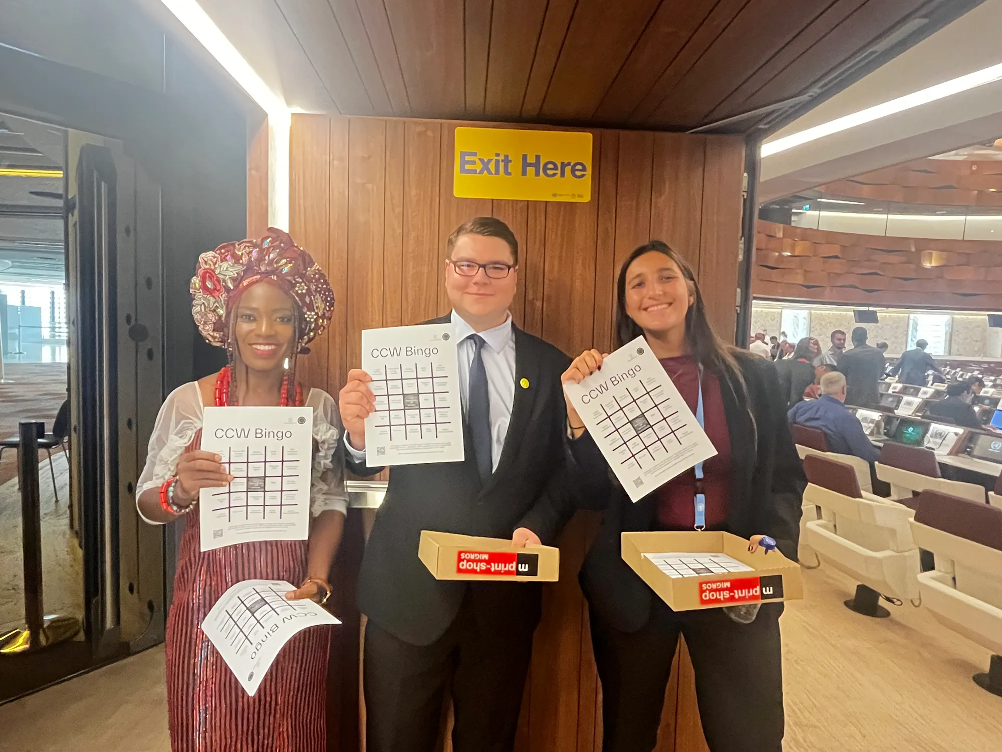 Delegates from civil society show the Bingo applied by the InterAgency Institute and the Stop Killer Robots Campaign in 2024